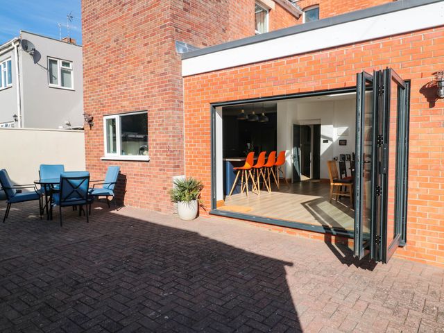 An outdoor area with a seating arrangement at Ashbourne House