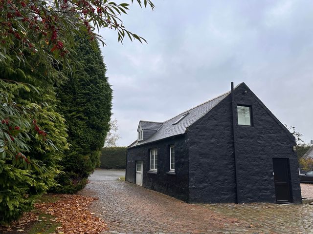 A black house with a path surrounded by trees at Pets - Garden - Parking - Sleeps up to 4 - Hiking, Banchory