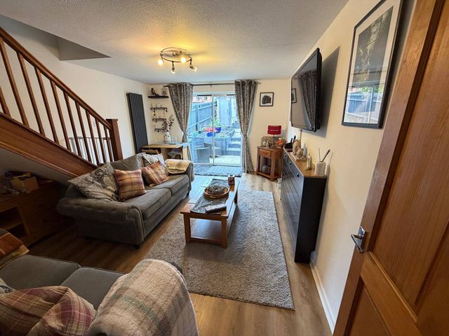 A living room with sofa and coffee table at Sleeps 5 pet friendly, Enclosed garden, Parking Belmont near Hereford