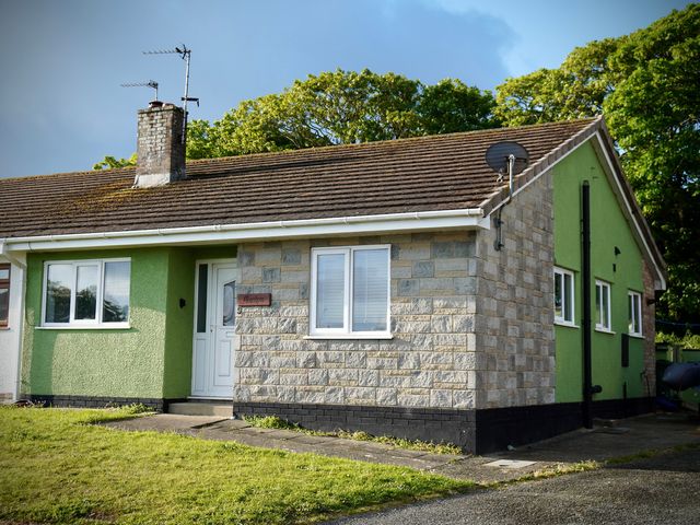 A house with a garden and chimney at Ty Marlyn St Davids