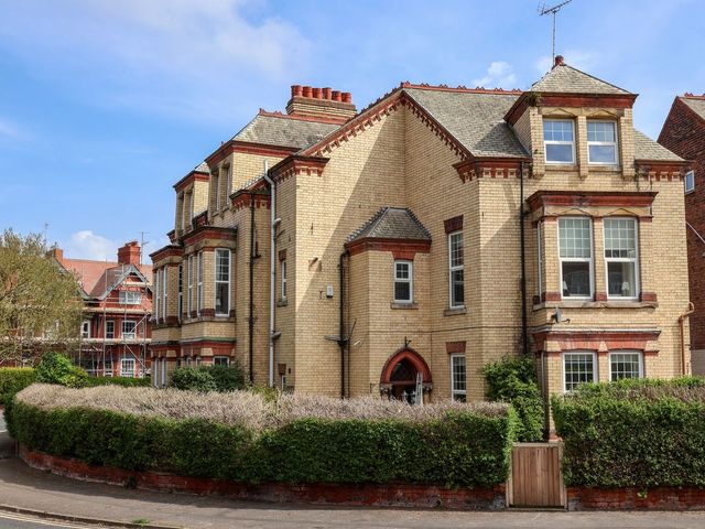 An exterior view of a building with multiple windows at Trinity Lodge in Bridlington