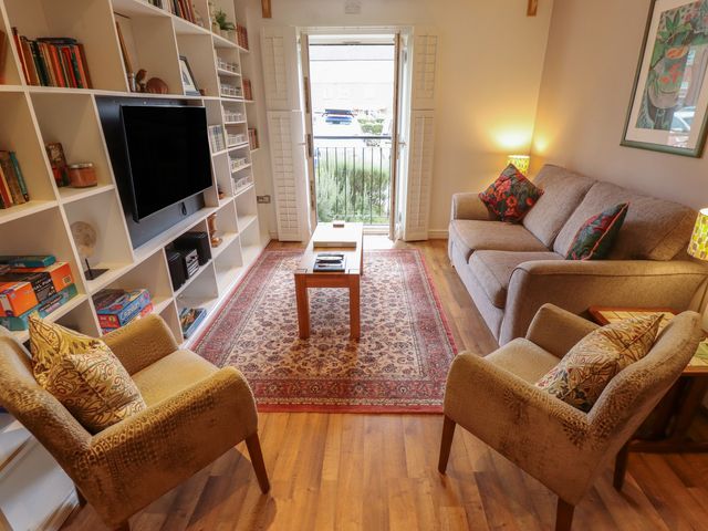 A living room with a sofa and coffee table at Apartment 173 in Lincoln