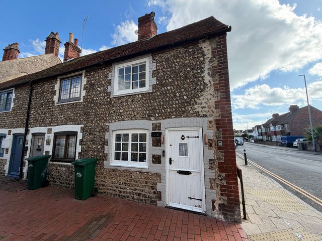 A house exterior with a door and windows in Brighton and Hove
