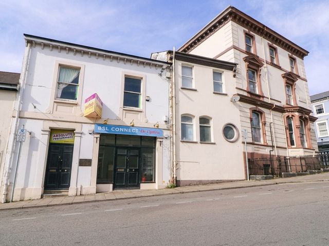 An office building with signage and windows at 6 Caxton Place Newport, South Wales