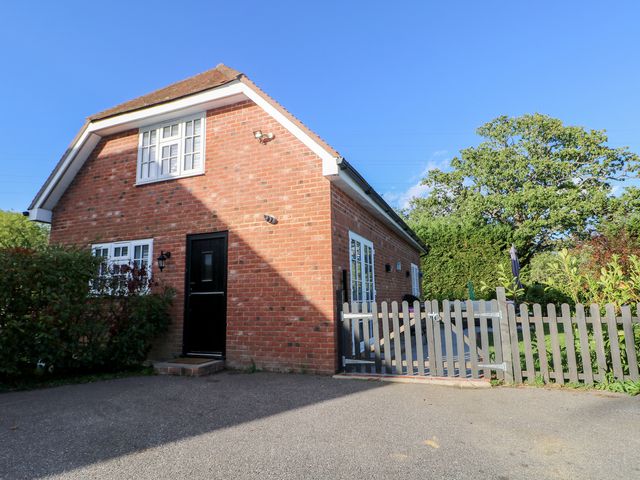 A house with a garden and fence at Ridings in Claygate near Maidstone