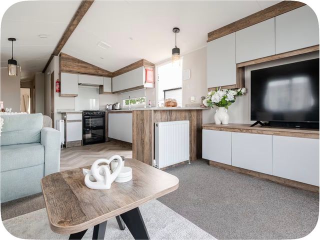 A living room with a sofa and coffee table at Brookwood Willerby, 36 bay view, Filey