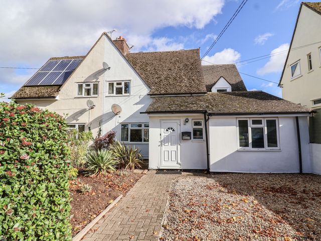 A house with a garden and solar panels at 19 Hailey Road