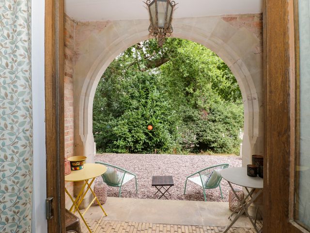 An outdoor area with a table and chairs at Diamond Lodge Ingestre near Great Haywood