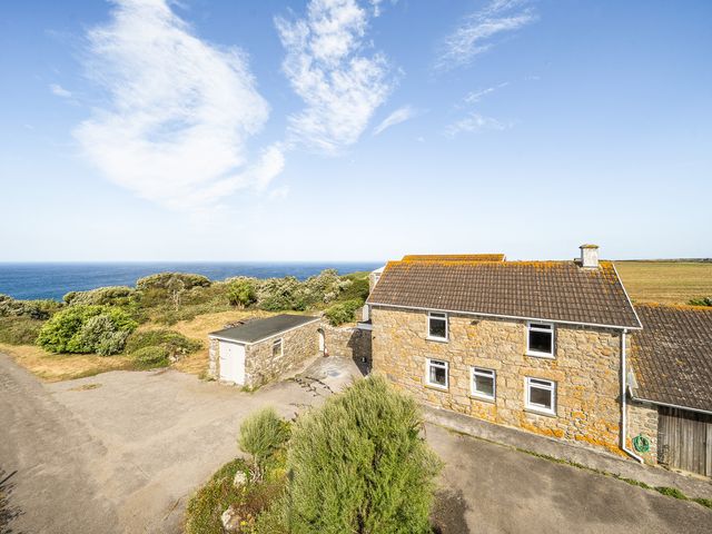 A house with a garage and view of the sea at Tregiffian Vean Sennen Cove