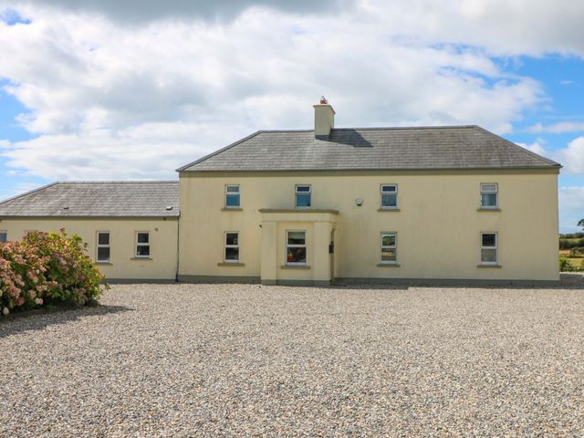 A house with windows and door at Sanderling Lodge in Tacumshane, County Wexford