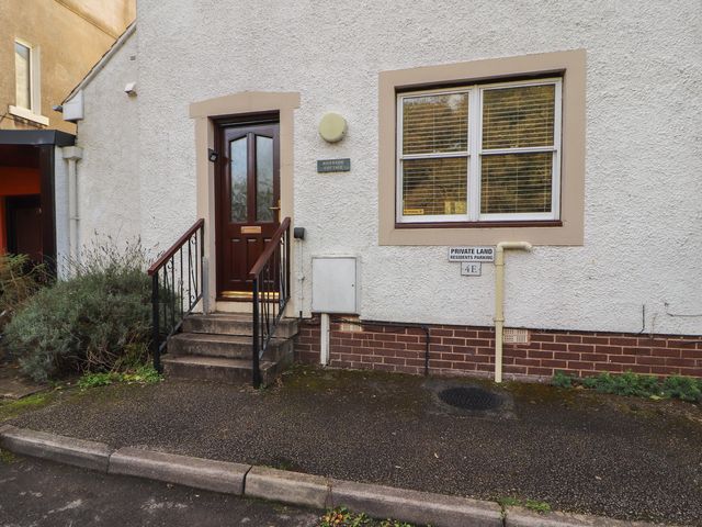 An entrance with steps and a door to Riverside Cottage Cockermouth