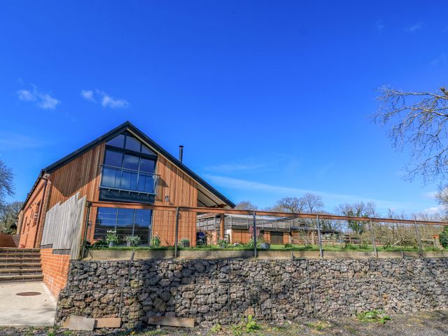 A house with gardens and steps at The Old Dairy Cotleigh near Honiton