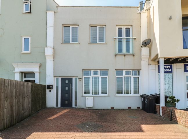 A building facade with windows and door at 38 The Parade Walton-On-The-Naze