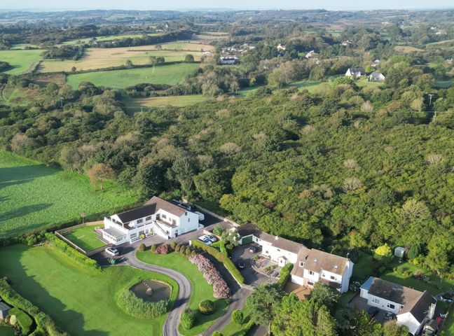 An aerial view of houses and gardens in an outdoor area at Top Of The Lane Luxury Holiday Apartment Benllech