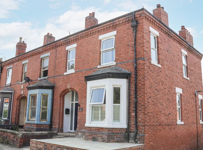 A brick house with multiple windows at 33 Lorne Street, Chester