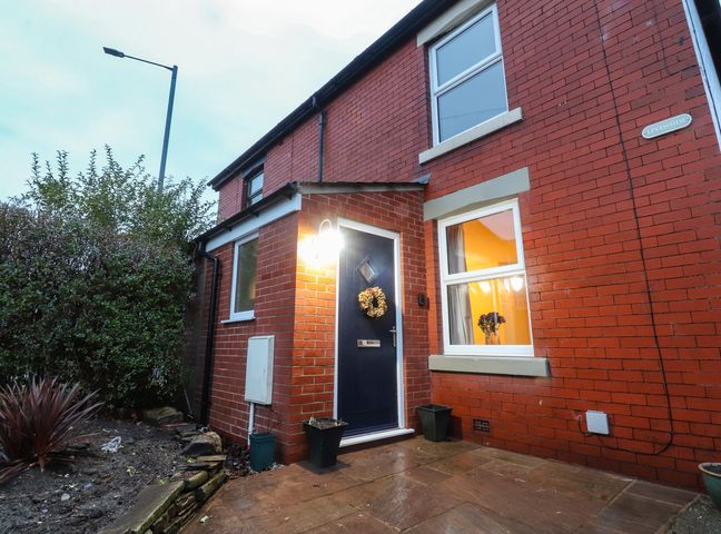 A front entrance with a decorated door and plants at Levenside Preston