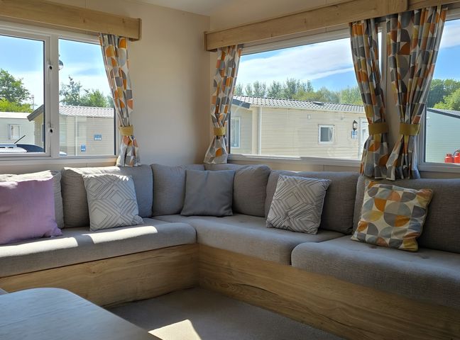A living room with seating area at Caravan