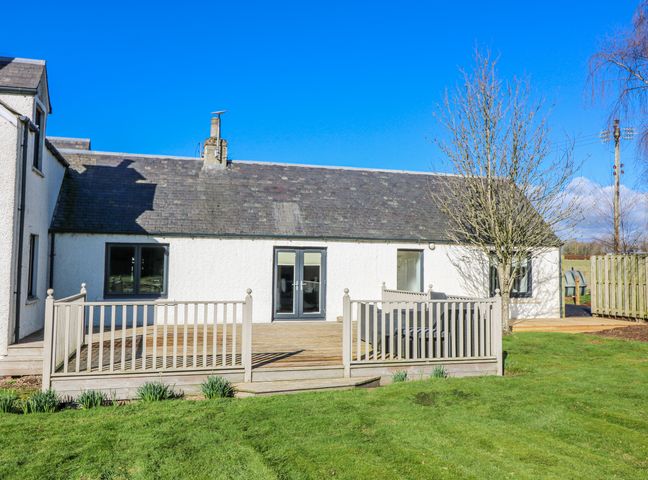 An outdoor view of a house with a decking area at Norwood