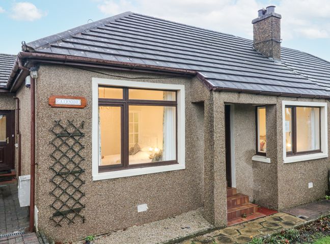 A house exterior with windows and door at Cairndhu in Bossiney