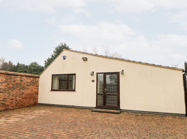 A building with a door and window at Millers Retreat in Chesterfield