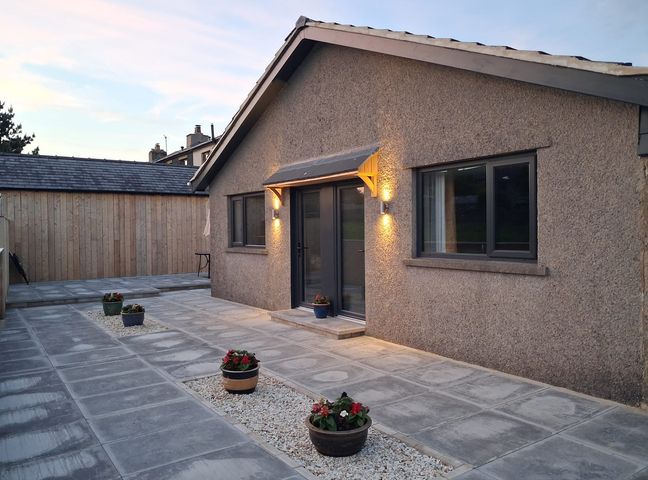 A house with a front door and patio at Beckdale in Horton-in-Ribblesdale near Settle
