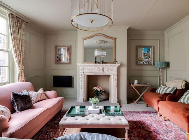 A living room with a fireplace and sofas at Luxury Georgian Townhouse / sleeps 10 / parking