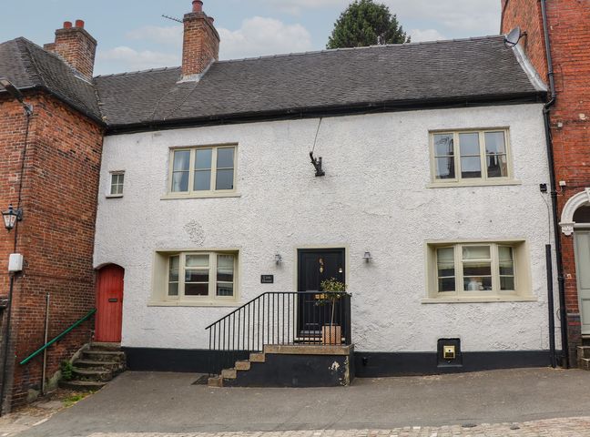A house with a front door and windows at Lion House in Ashbourne