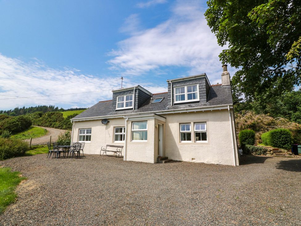 A house with windows and a gravel driveway at Cairnhill in Girvan
