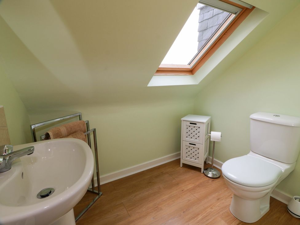 A bathroom with a sink and toilet at Cairnhill in Girvan