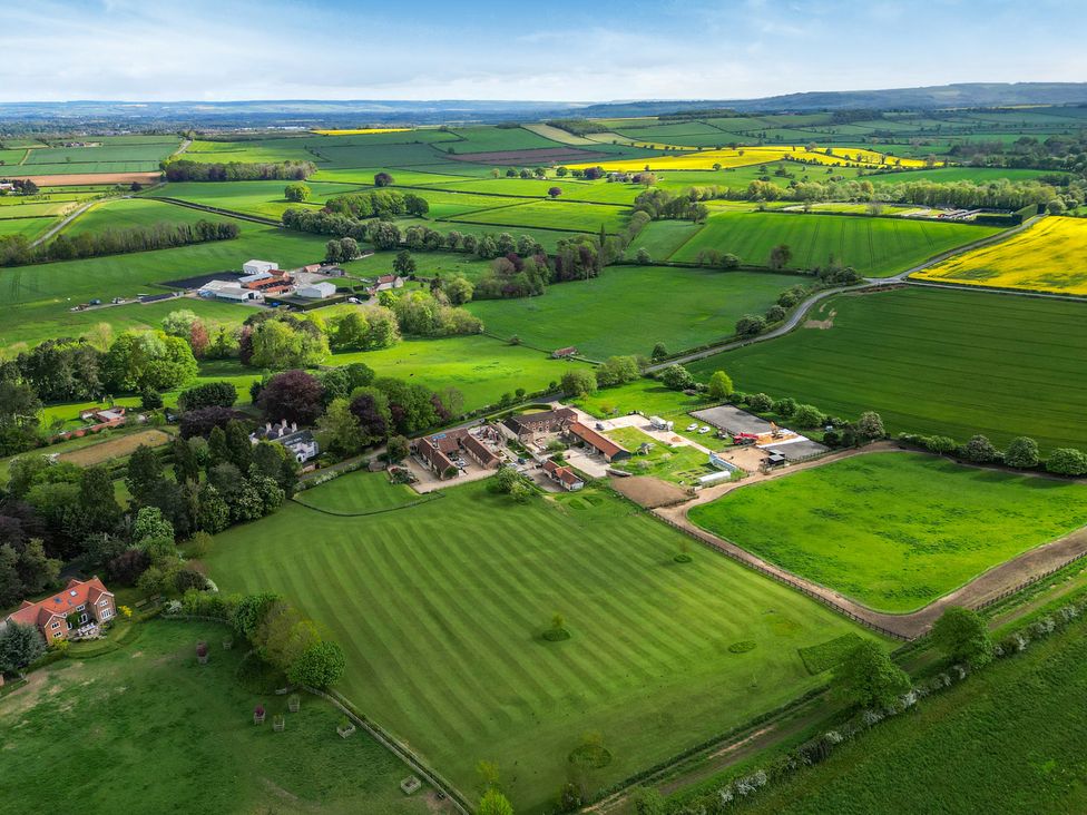 An aerial view of farmland and fields at Sykes Lodge in Malton