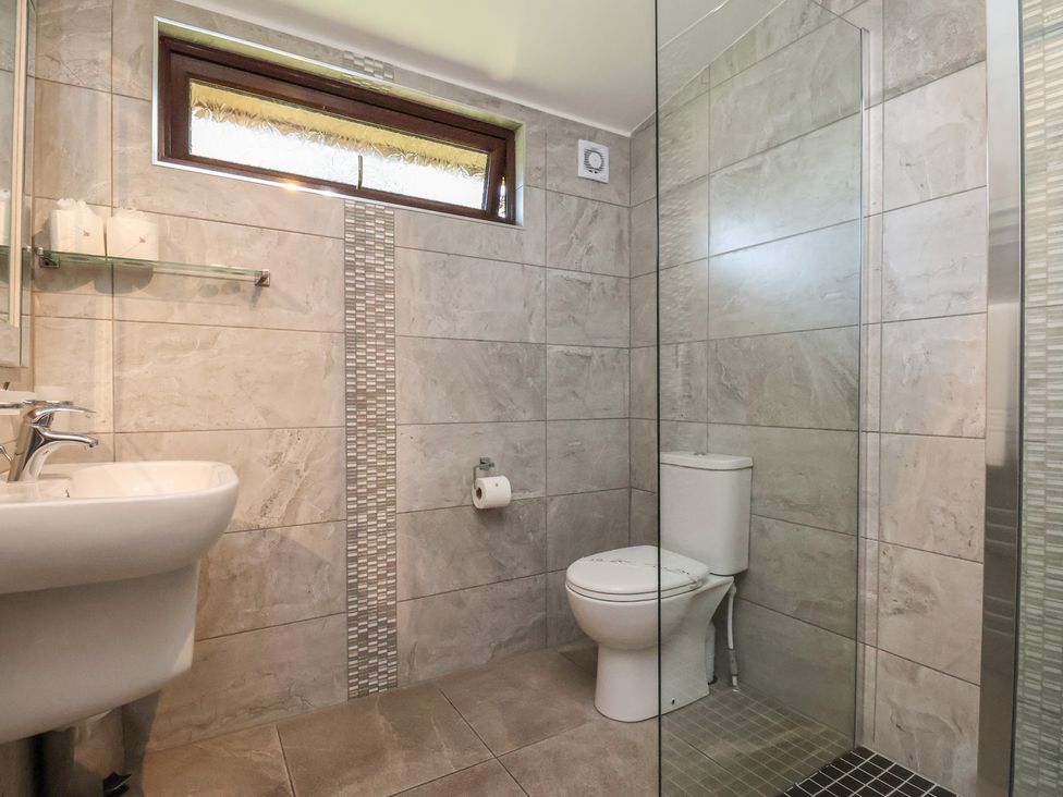 A bathroom with a sink and toilet at Foxglove Lodge in Saltburn-By-The-Sea