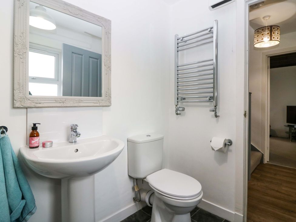 A bathroom with a sink and toilet at Birds Nest in Jedburgh
