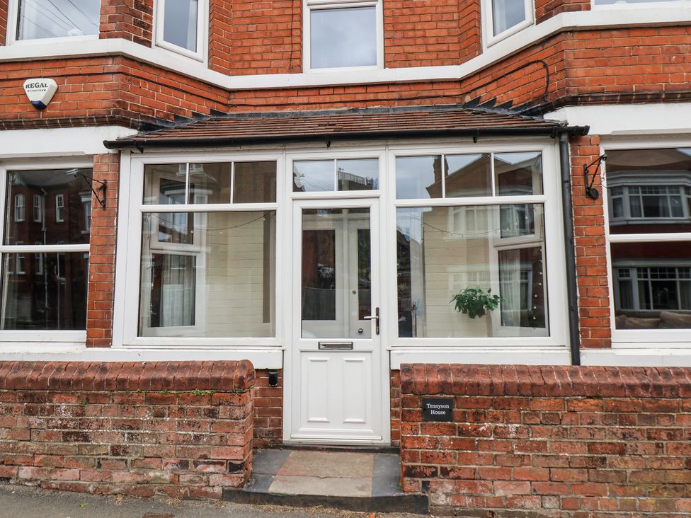 A front entrance with a door and windows at Tennyson House in Scarborough