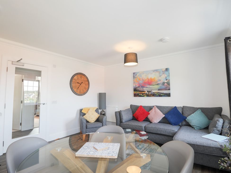 A living room with a sofa and coffee table at The Nook in Culloden