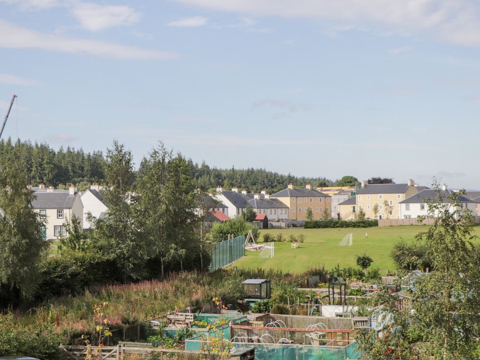A view of houses and garden plots at The Nook in Culloden