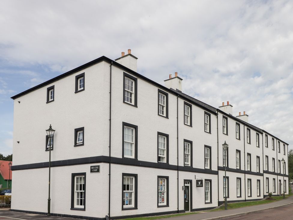 An exterior view of a building with windows and a lamp post at The Nook in Culloden