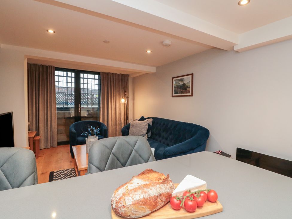 A living room with furniture and decor at Blue Peter @ Engine Shed Whitby