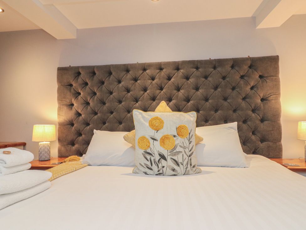 A bedroom with a bed and pillows at Blue Peter @ Engine Shed in Whitby