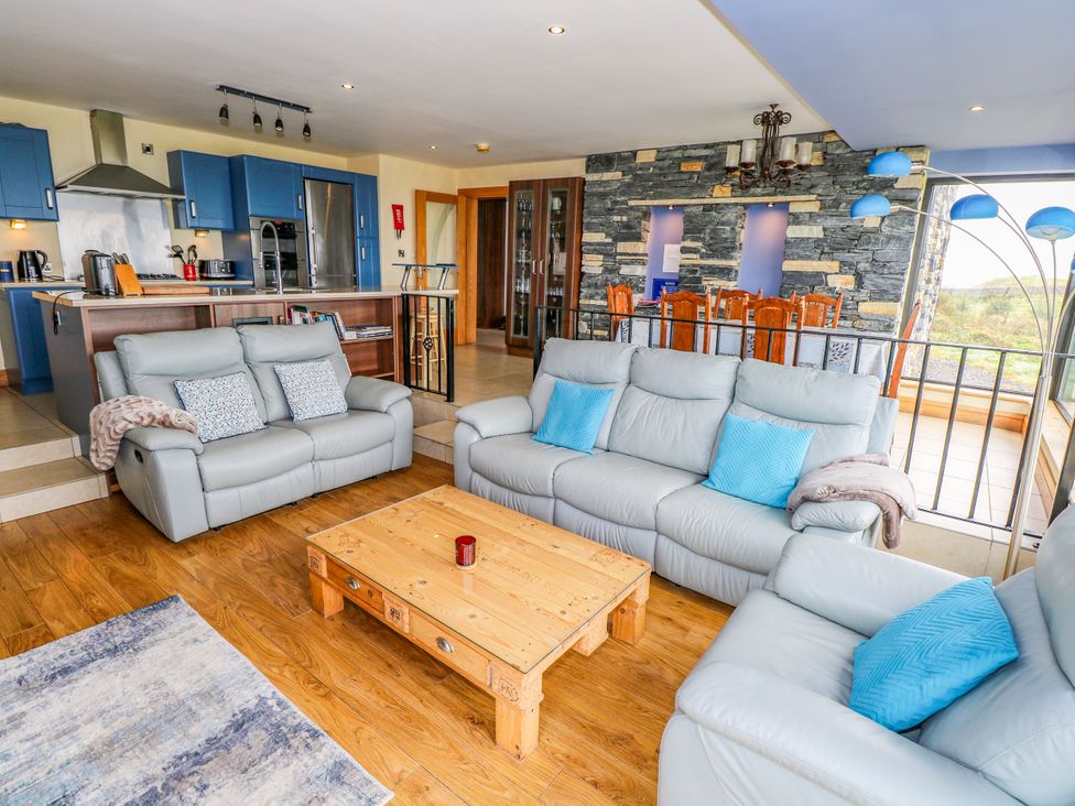 A living room with sofas and a coffee table at Ocean Sail House Termon near Dungloe, County Donegal