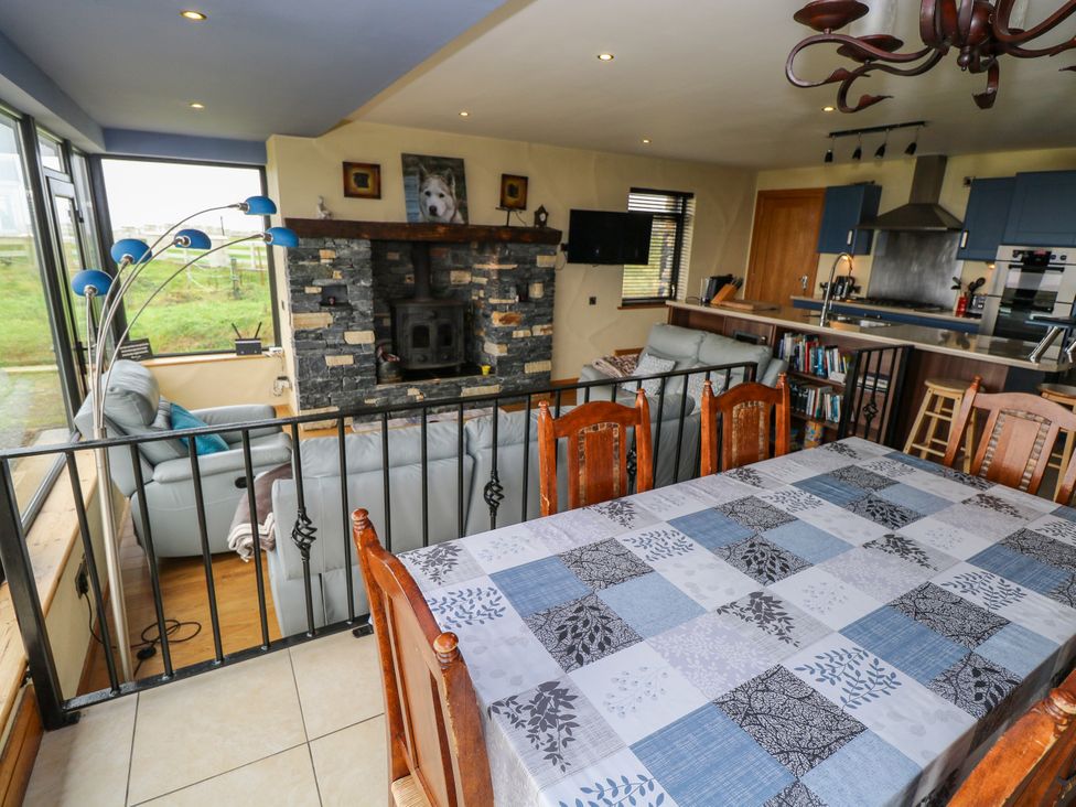 A dining room with a table and chairs at Ocean Sail House Termon near Dungloe County Donegal
