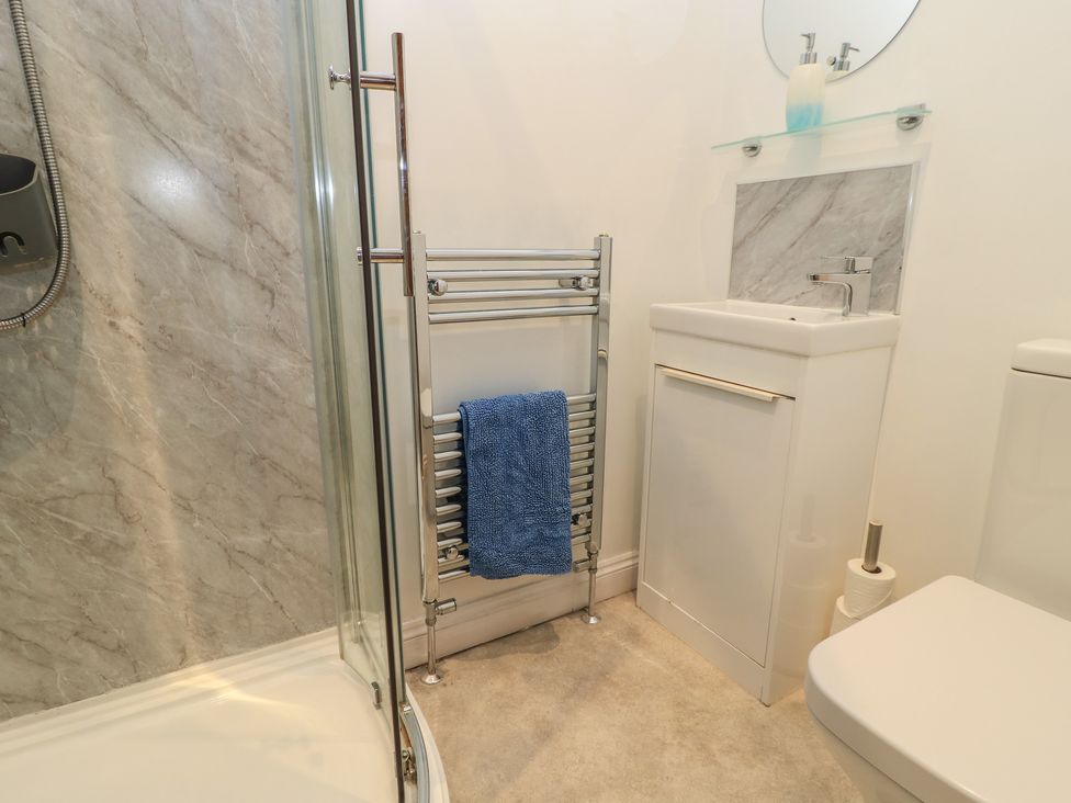 A bathroom with a shower, sink, and towel radiator at Dale Barton in Wells