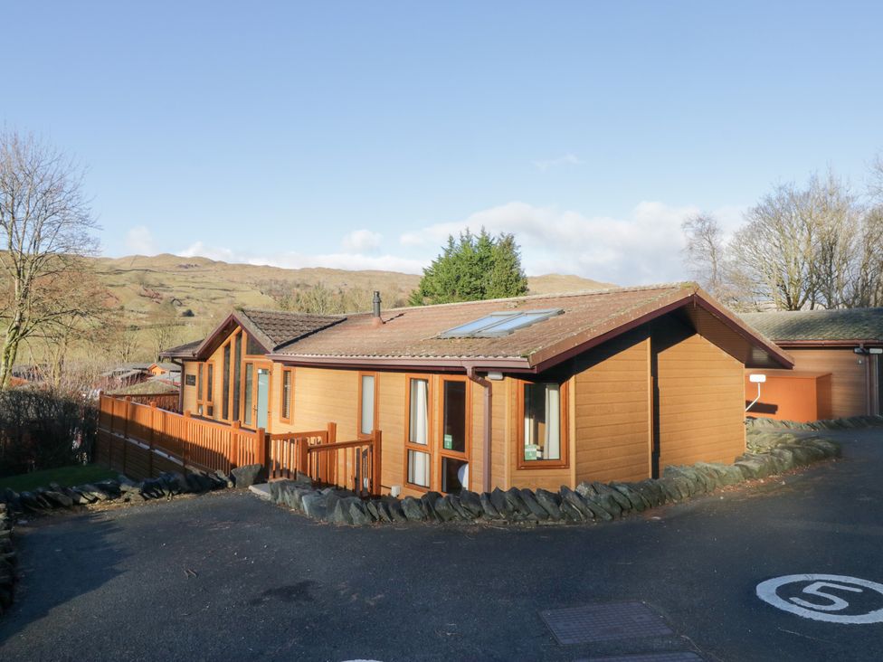 A house with windows and a fence at Heights View in 