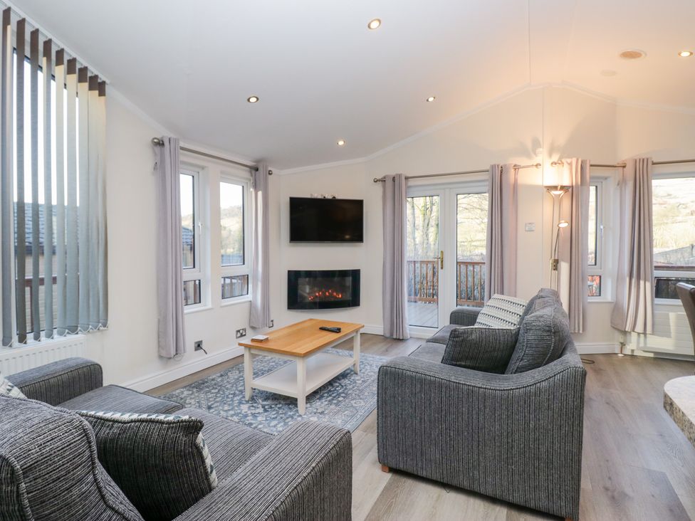 A living room with a sofa and coffee table at Heights View 