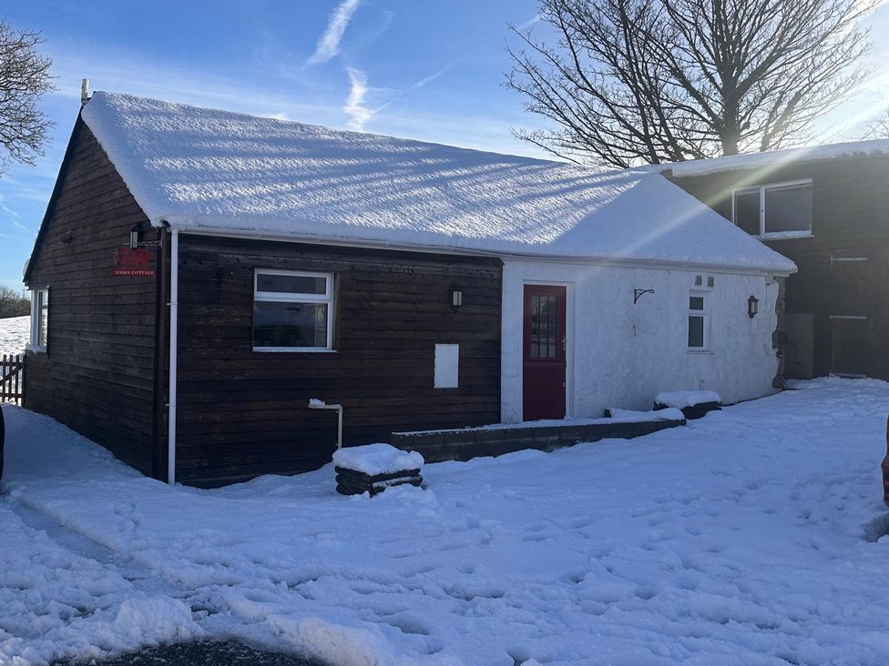 A house covered in snow at Dairy Cottage Tavernspite near Narberth