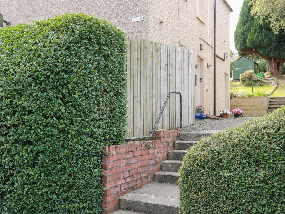 An outdoor area with steps leading to a house at Simply Suite Castle Douglas