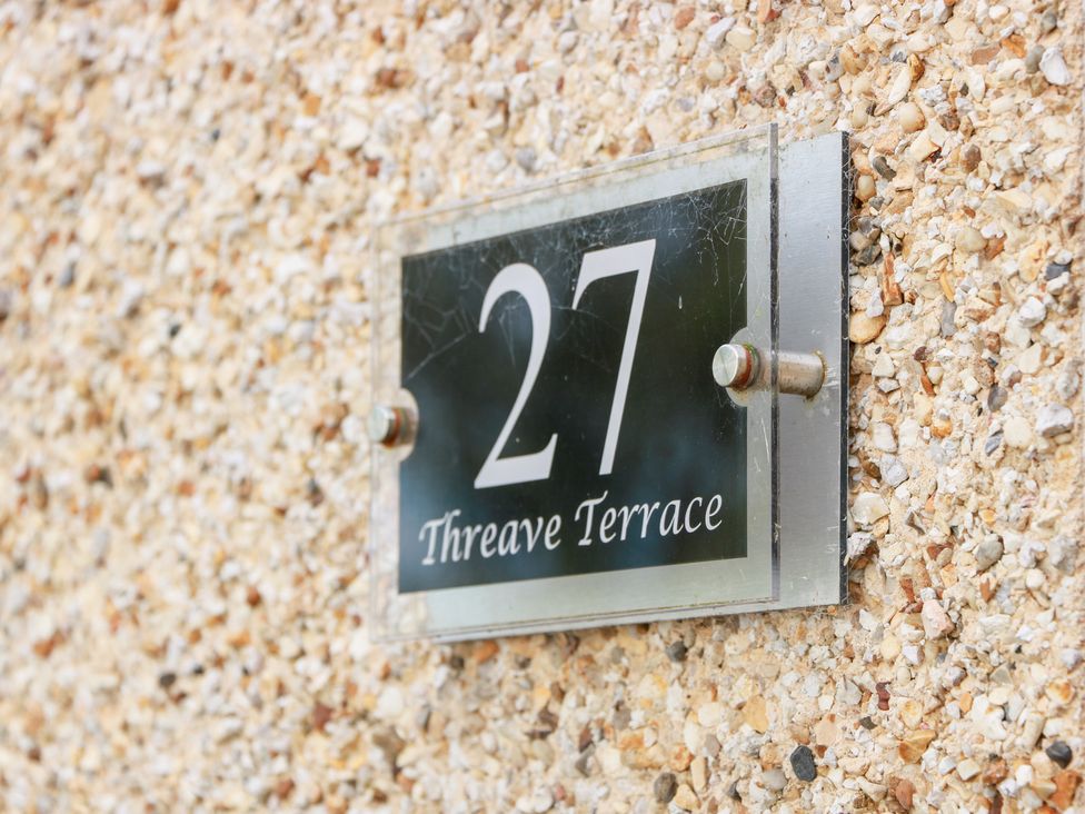 A house number sign displaying 27 Threave Terrace
