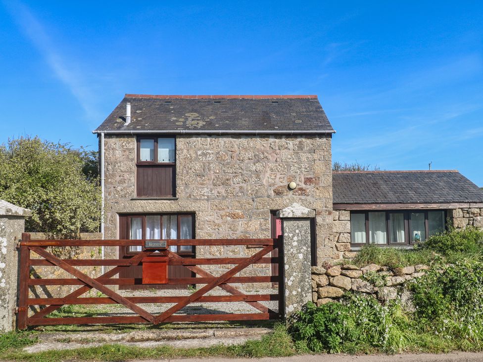 A stone house with a gate at Kernyk in Penzance