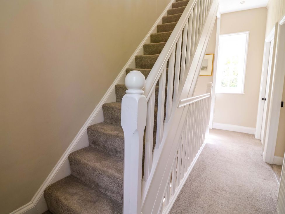 A staircase leading to upper floor in South Tower Cottage Capesthorne near Macclesfield