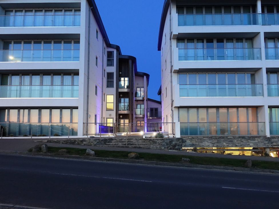 Two modern buildings with balconies and windows at 28 Zenith in Porth