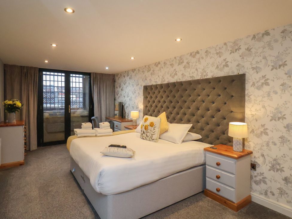 A bedroom with a bed and a window at Premier, Transit & Lady Hilda @ Engine Shed, Whitby